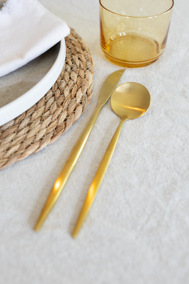Linen, ceramic, and wood textures layered together for an easy earthy fall tablescape