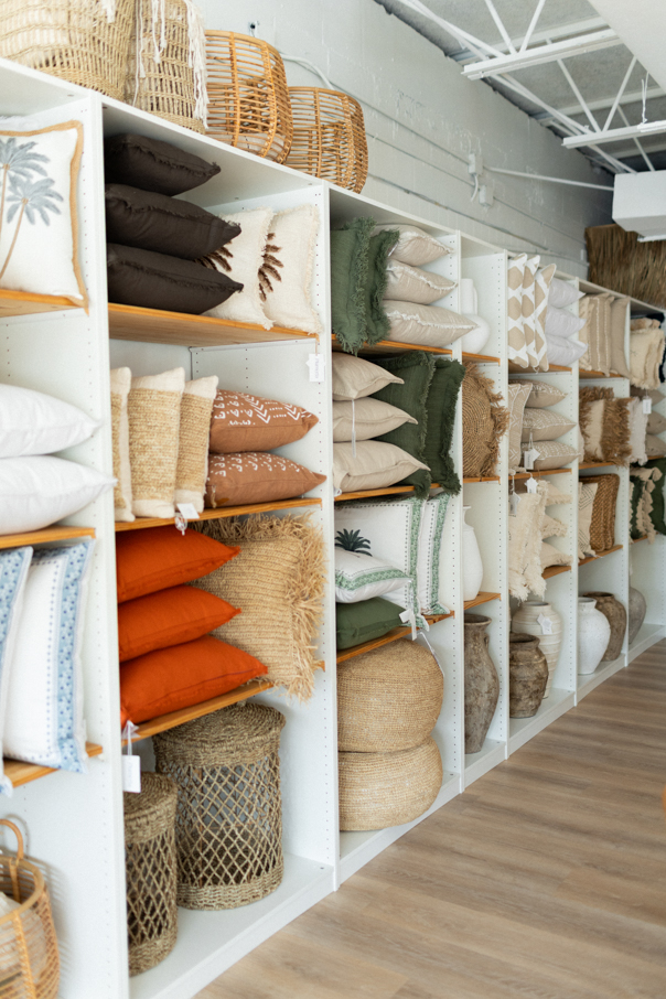 Neutral earthy pillows at Plumeria Home Decor & Design
