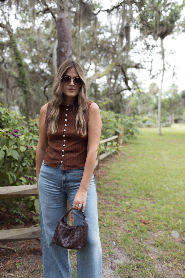 Andi wearing wide legged jeans