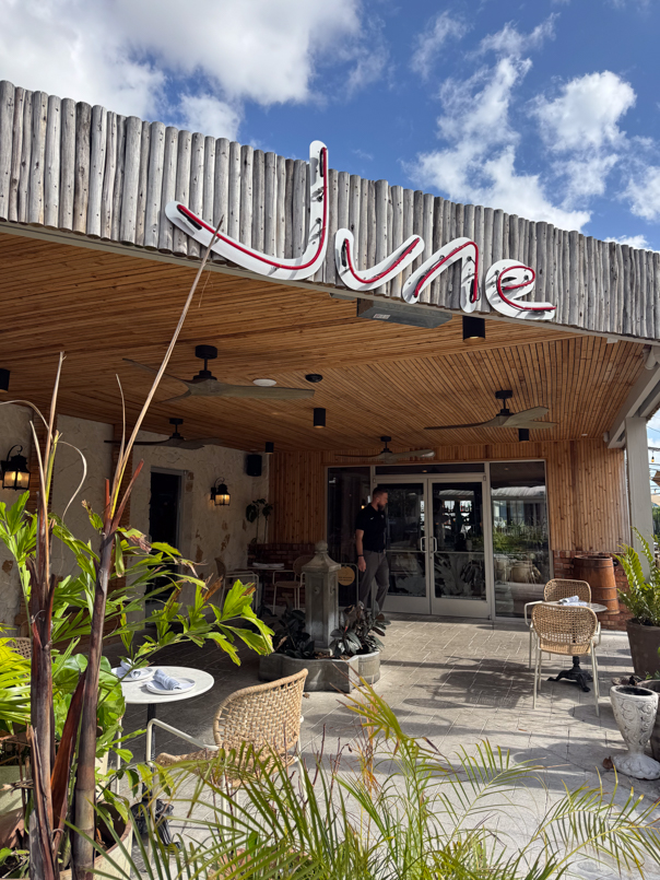 Exterior of JUNE restaurant in Orlando with modern, minimalist design