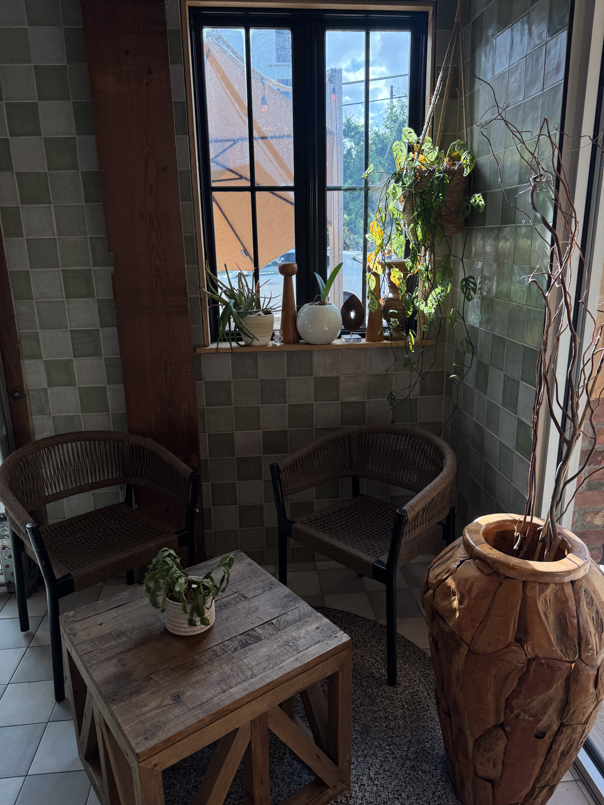 Minimalist dining space at JUNE restaurant Orlando with warm, earthy textures